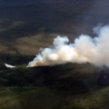 Photo of a Fire Boss airplane dropping water in front of the Kuyukutuk River Fire (#224) on June 14, 2019.