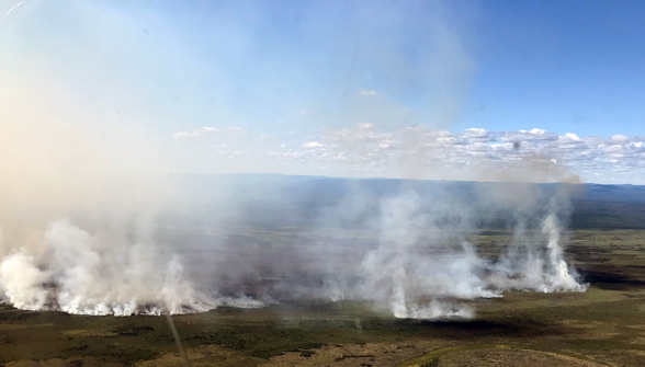 Photo of Sheenjek Fire burning north of Fort Yukon on July 7, 2020. Photo by Chris Demers, BLM AFS.
